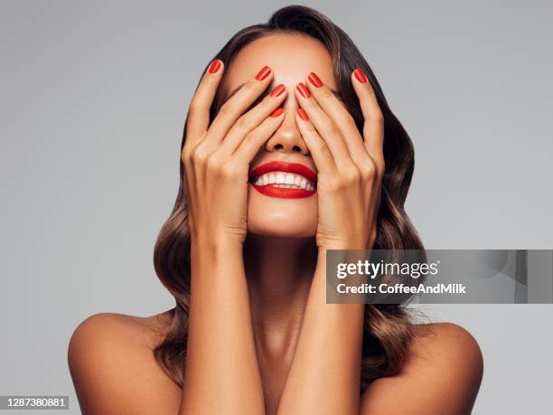 beautiful woman - hands in the face stock pictures, royalty-free photos & images