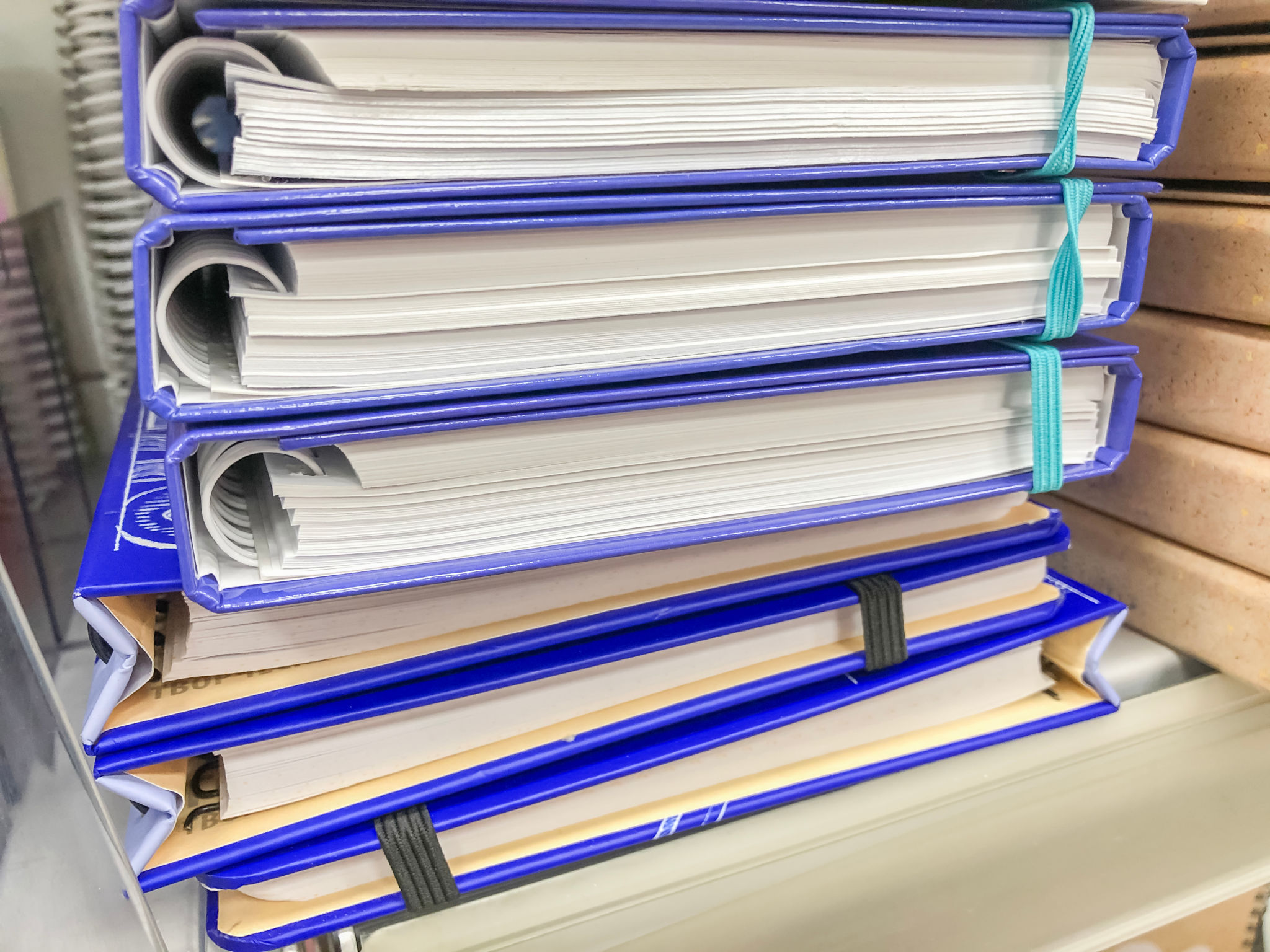 School and office supplies, a view of diaries and books in bright colors on the student shelf. School and office supplies, a view of diaries and books in bright colors on the student shelf.