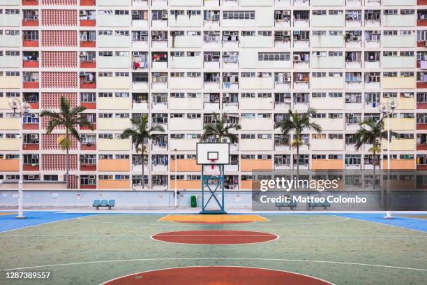 colorful playground in a residential complex, hong kong - atrium grundstück stock-fotos und bilder