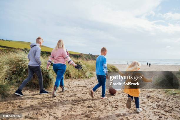 family staycation - beach holiday uk stock pictures, royalty-free photos & images
