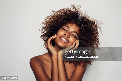 Beautiful afro woman with perfect make-up Beautiful afro woman with perfect make-up