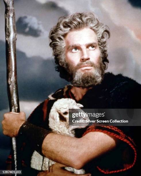 American actor Charlton Heston as Moses in a publicity still for the biblical epic film 'The Ten Commandments', 1956.