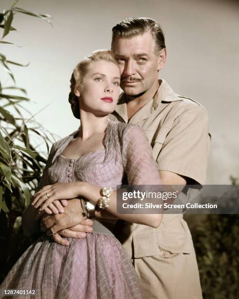 American actors Clark Gable as big game hunter Victor Marswell and Grace Kelly as Linda Nordley in a publicity still for the film 'Mogambo', 1953.