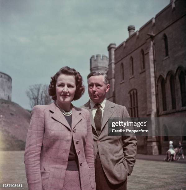 Bernard Fitzalan-Howard, 16th Duke of Norfolk posed with his wife Lavinia Fitzalan-Howard, Duchess of Norfolk in the grounds of Arundel Castle,...