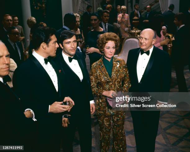 Paul Burke , Tony Scotti, Susan Hayward and Robert H. Harris in Mark Robson's 1967 drama, 'Valley Of The Dolls'.