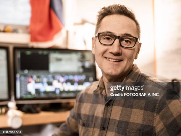 male video editor working at home - film editor stock pictures, royalty-free photos & images