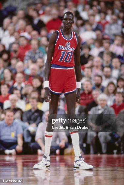 Manute Bol, Center for the Washington Bullets during the NBA Pacific Division basketball game against the Portland Trail Blazers on 20th November...