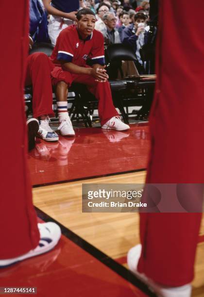 Muggsy Bogues, Point Guard for the Washington Bullets sits on the bench during the NBA Pacific Division basketball game against the Portland Trail...