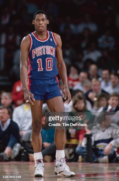 Dennis Rodman, Power Forward for the Detroit Pistons during the NBA Midwest Division basketball game against the Denver Nuggets on 12th December 1989...