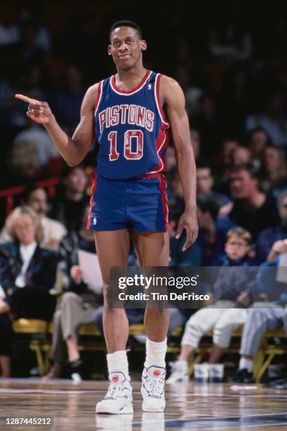 Dennis Rodman, Power Forward for the Detroit Pistons during the NBA Midwest Division basketball game against the Denver Nuggets on 25th March 1991 at...