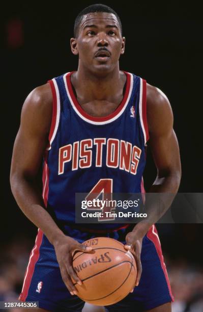 Joe Dumars, Shooting Guard for the Detroit Pistons prepares to make a free throw during the NBA Midwest Division basketball game against the Denver...