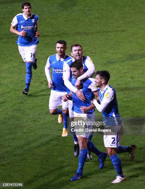 Lukas Jutkiewicz of Birmingham City celebrates after scoring their sides first goal from the penalty spot with Maxime Colin during the Sky Bet...