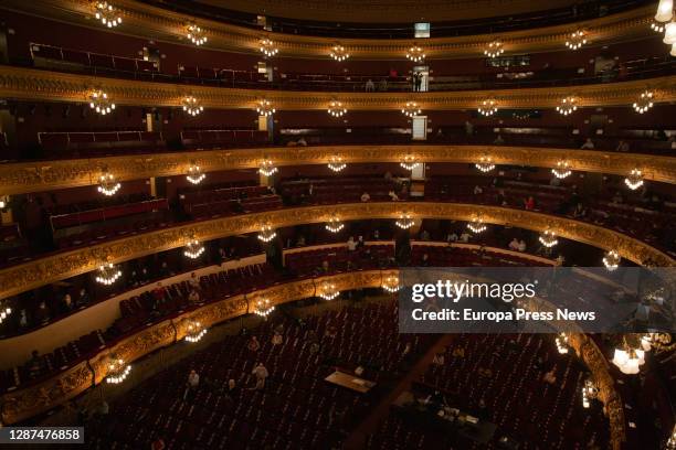 View of the theatre boxes and the seating area during the rehearsal of a scene from 'La Traviata' with piano, soloists and chorus in the Liceu, on...