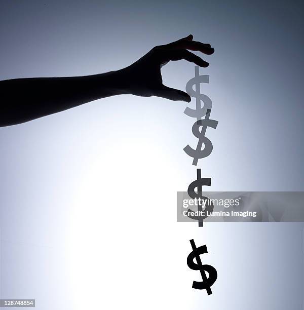 falling dollar - releasing money stock pictures, royalty-free photos & images