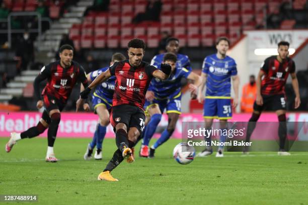 Junior Stanislas of AFC Bournemouth scores their team's second goal from a penalty during the Sky Bet Championship match between AFC Bournemouth and...