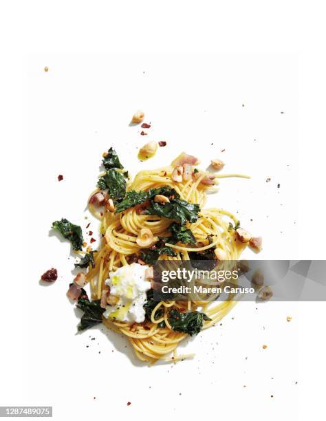 gf pasta with kale and burrata - crucifers stock pictures, royalty-free photos & images