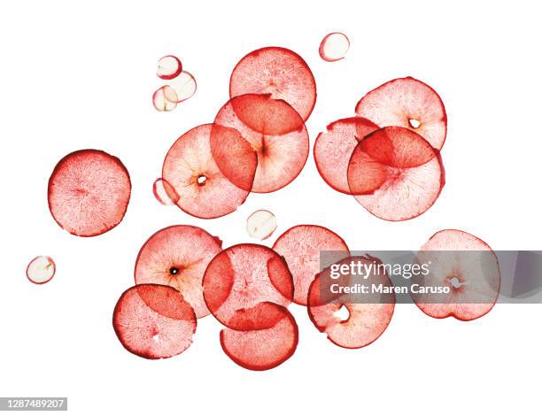 slices of plums and grapes - fruit art stockfoto's en -beelden