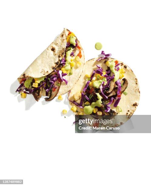 grilled corn and portabello tacos - mexican food stockfoto's en -beelden