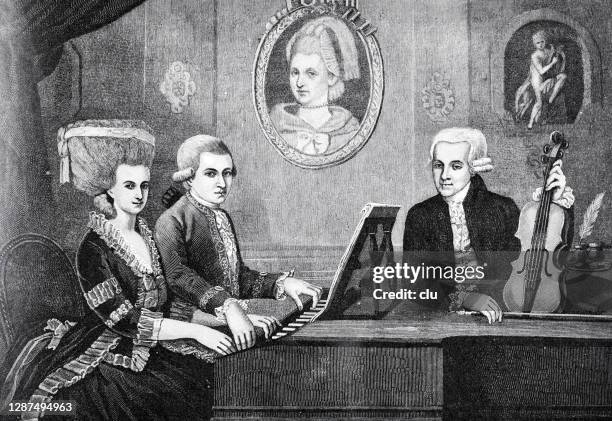 mozart family, wolfang amadeus mozart with father and mother at the piano - mozart stock illustrations