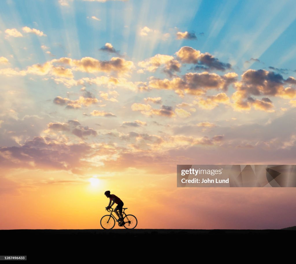 Cyclist At Dawn