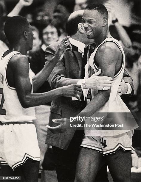 Len Bias leaves his final regular season game for the University of Maryland Terps in coach Lefty's embrace, and with greeting from fellow senior...