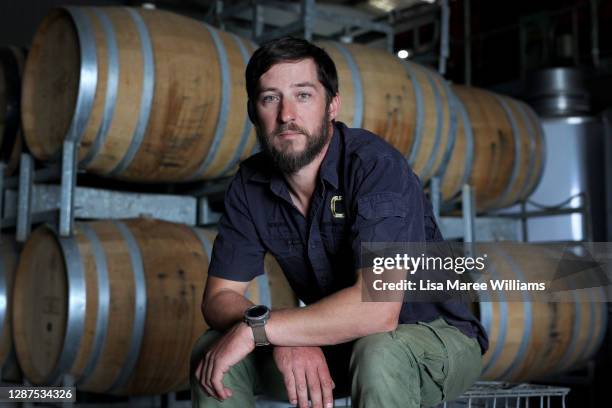 Adrian Brayne sits in the processing building at Obsession Wines on November 24, 2020 in Tumbarumba, Australia. Second-generation winemaker and owner...