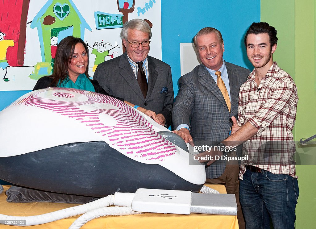 Kevin Jonas Unveils The AOL Media Room At The Ronald McDonald House