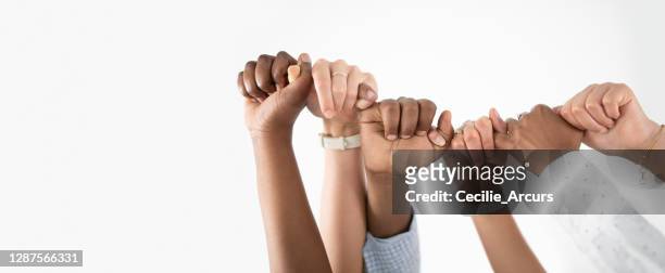 we stand in solidarity - hand white background stock pictures, royalty-free photos & images
