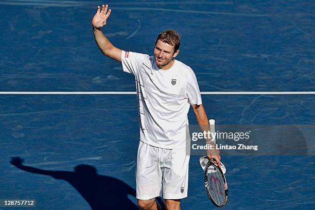 Mardy Fish of the United States celebrates after winning his quarter final match against Bernard Tomic of Australia during day five of the Rakuten...