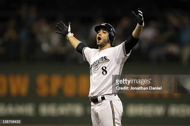 Ryan Braun of the Milwaukee Brewers reacts after hitting a double in the sixth inning off pitcher Ian Kennedy of the Arizona Diamondbacks in Game...