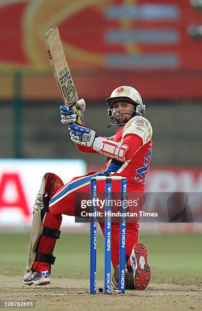 Royal Challengers Bangalore batsman, Tilakratne Dilshan, playing the scoop shot to fine-leg region during the Champions League Twenty20 Semi Final...