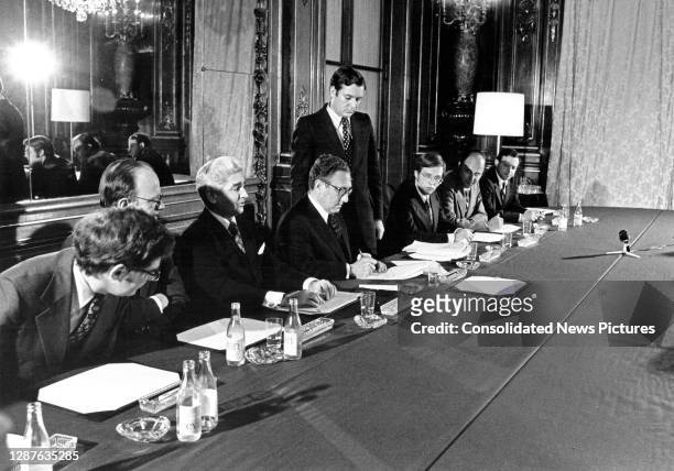 National Security Advisor Henry Kissinger initials the Paris Peace Accords in the International Conference Center, Paris, France, January 23, 1973....