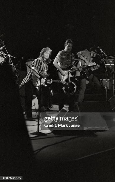 Bonnie Raitt performs during the warmup act of a Soul to Soul Tour concert featuring Stevie Ray Vaughan and his Double Trouble band at Red Rocks...