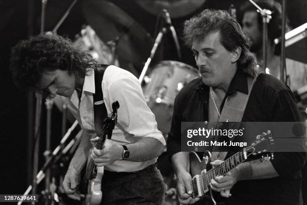 Guitarists in the Gregg Allman band perform in a warmup act prior to the Stevie Ray Vaughan concert at Red Rocks Amphitheatre on June 17, 1987 in...