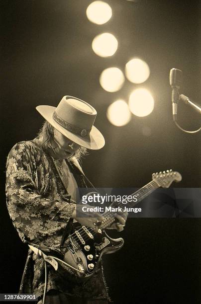 Stevie Ray Vaughan plays his guitar during a Soul to Soul Tour concert at the University of Wyoming Arts & Sciences Auditorium on October 7, 1985 in...