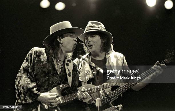 Stevie Ray Vaughan is accompanied by his Double Trouble band bass player, Tommy Shannon, during a concert at the University of Wyoming Arts &...