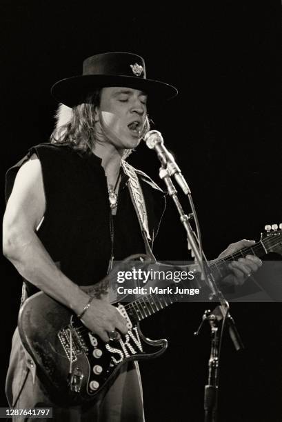 Stevie Ray Vaughan and his band Double Trouble perform during a concert at Red Rocks Amphitheatre on June 17, 1987 in Morrison, Colorado. The image...