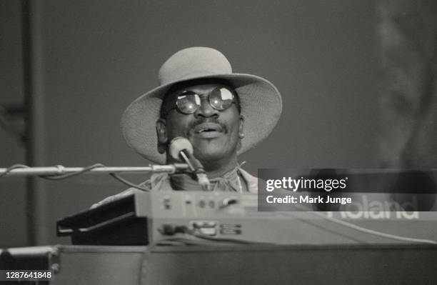 Taj Mahal performs at the keyboard in a warmup act during the Stevie Ray Vaughan Soul to Soul Tour concert at Red Rocks Amphitheatre on July 24, 1986...