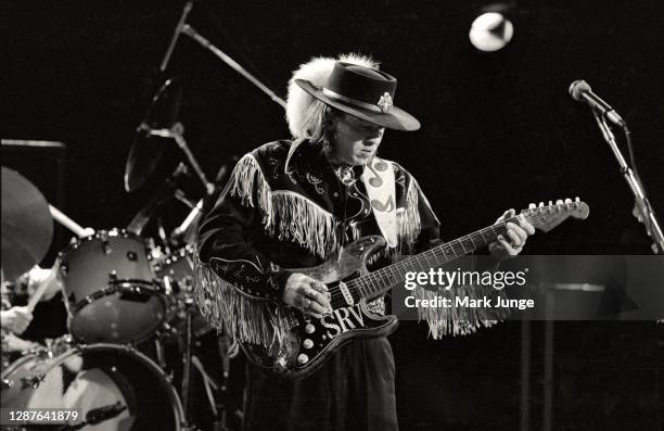 Stevie Ray Vaughan performs during a Soul to Soul Tour concert at Red Rocks Amphitheatre on July 24, 1986 in Morrison, Colorado. The image was tinted...