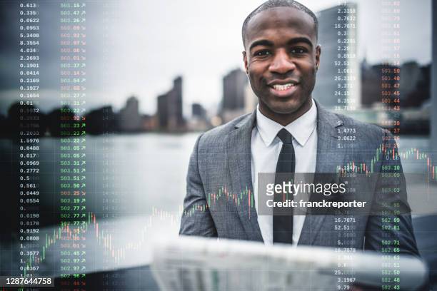 man working in the stock exchange - backgrounds people imagens e fotografias de stock