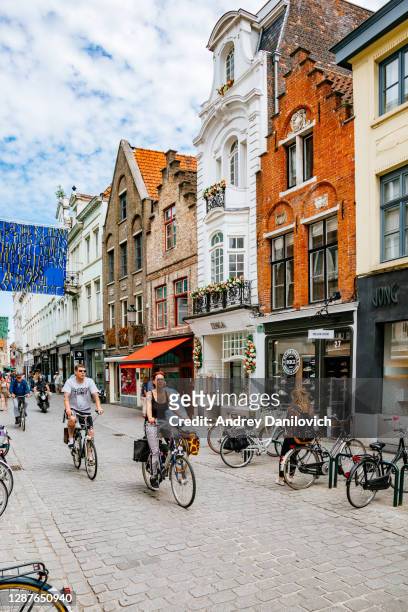 a street in the centre of bruges. - brugge stock pictures, royalty-free photos & images