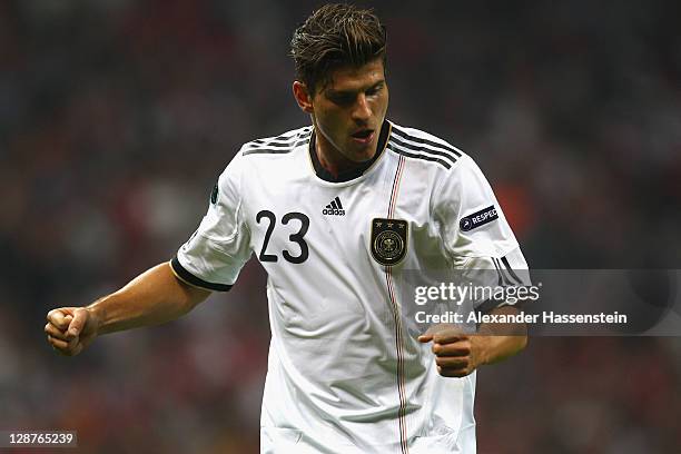 Mario Gomez of Germany celebrates scoring the opening goal during the UEFA EURO 2012 Group A qualifying match between Turkey and Germany at Tuerk...