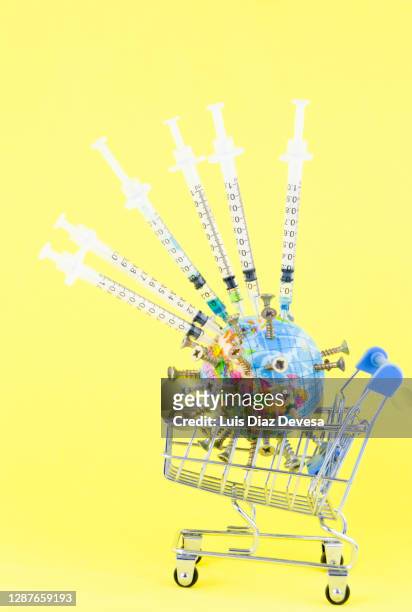 all countries are buying vaccines for the entire population (covid 19) coronavirus - epidemic concept stock pictures, royalty-free photos & images