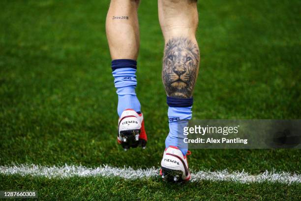 Lion tattoo is seen on Aden Flint of Cardiff City leg prior to the Sky Bet Championship match between Coventry City and Cardiff City at St Andrew's...