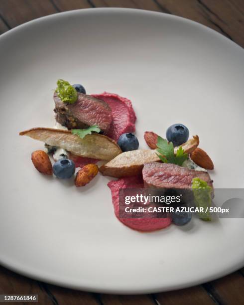 high angle view of food in plate on table,london,united kingdom,uk - azucar stock pictures, royalty-free photos & images