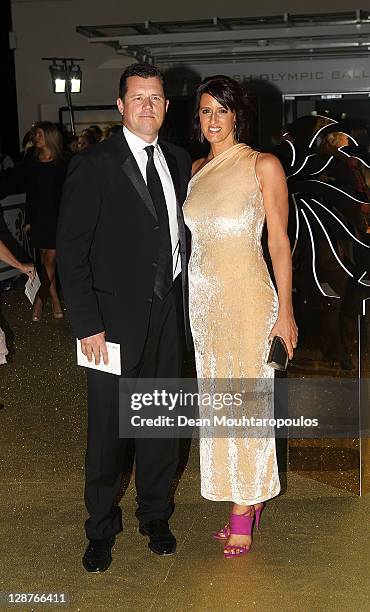 Athlete Karen Pickering and guest arrives at the British Olympic Ball 2011 held at Kensington Olympia on October 7, 2011 in London, England.