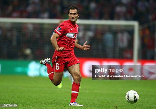 Hamit Altintop of Turkey runs with the ball with during the UEFA EURO 2012 Group A qualifying match between Turkey and Germany at Tuerk Telekom Arena...