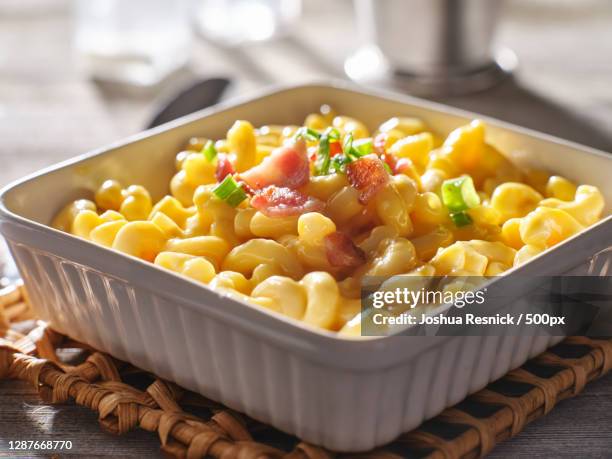 close-up of pasta in bowl on table - macaroni salad stock pictures, royalty-free photos & images