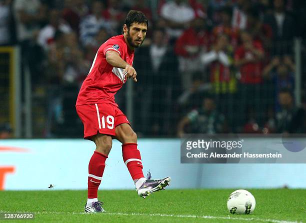 Egemen Korkmaz of Turkey runs with the ball with during the UEFA EURO 2012 Group A qualifying match between Turkey and Germany at Tuerk Telekom Arena...