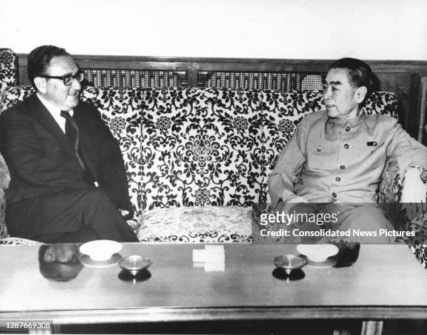National Security Advisor Henry Kissinger and Chinese Premier Chou En-lai talk together at the Government Guest House, Beijing, China, July 9, 1971.